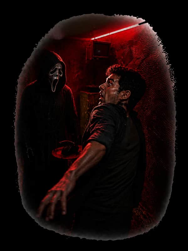 The scariest level: a masked actor reaches out of the dark